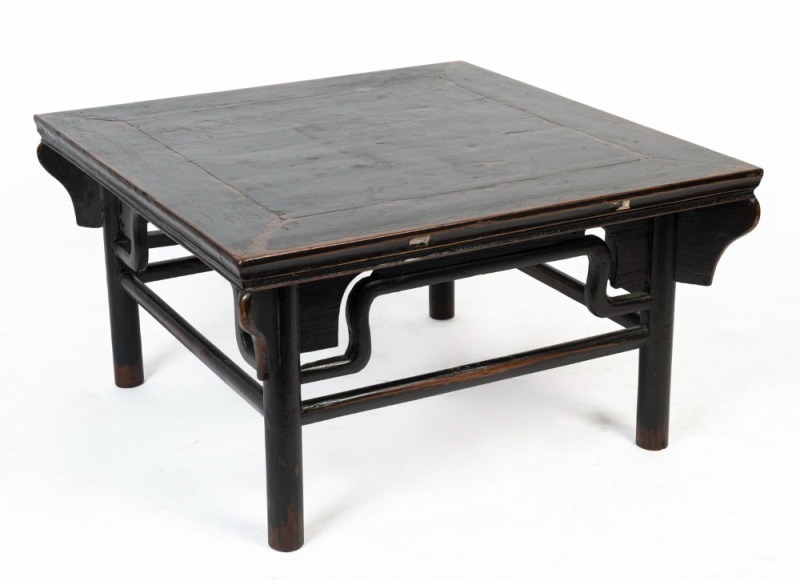 A Japanese square tea table, carved wood with black lacquered finish, 20th century, ​​​​​​​50cm high, 88cm wide, 88cm deep