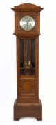 A German triple train spring-driven long cased oak clock, early to mid 20th century, ​​​​​​​183cm high