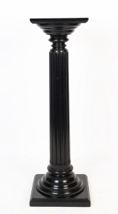 An antique reeded pedestal with ebonised finish, 122cm high, 35cm wide, 35cm deep