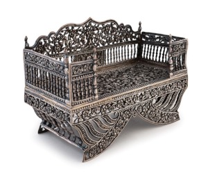 An antique Indian Kutch silver miniature howdah (elephant seat), 18th/19th century, 14cm high, 20cm wide, 9cm deep, 485 grams