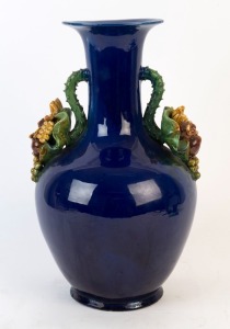 A blue porcelain vase with applied fruit handles, 20th century, 35cm high