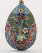 A superb Imperial Russian gilded silver and enamel spoon, hallmarked Moscow 88 and "AT" for FABERGE&nbsp;Workmaster&nbsp;Alfred Thielemann&nbsp;(who was active for FABERGE between 1890 and 1910); 19th century, 14cm long, 24 grams. - 2