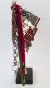 AKHA 'PHAMI' HEADDRESS: Made from Yunnan "Dragon" coins, 19th century Burmese glass beads, hand-made silver moon-shaped buttons, chains, pendants, tassels; gibbon fur; red-dyed chicken hackles and horsehair. circa 1930s. - 3