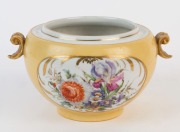 An Italian yellow porcelain vase with hand-painted floral vignettes, 19th/20th century, ​​​​​​​12cm high, 23cm wide