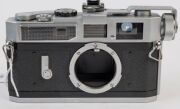Canon Model 7 rangefinder camera, 1961 [#938125] with Canon 50mm f0.95 lens [#21939], Canon Accessory Coupler and Canon 50 optical viewfinder; the lens additionally with UV 1x filter and lens hood. - 8