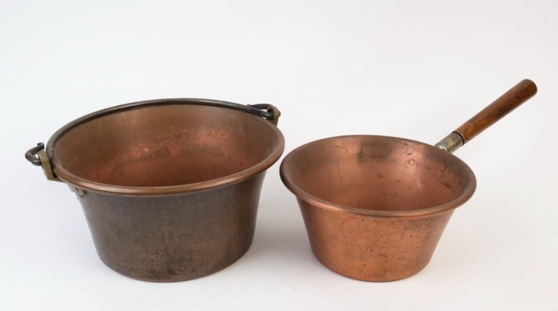 A copper preserving pan and a copper saucepan with a wooden handle, 19th/20th century, ​​​​​​​the preserving pan 39cm across the handle