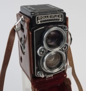 ROLLEI: Rolleiflex 2.8E twin-lens reflex camera [#1636122], circa 1956 with Zeiss Planar lens, with metal caps in maker's leather ERC. With manuals. - 2