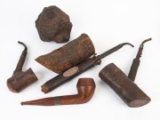 Group of four oversized novelty pipes, 19th and early 20th century, mostly point of sale advertising pieces, together with a burl timber point of sale advertising piece, (5 items), the largest pipe 65cm long