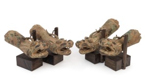 A set of four Chinese bronze dragon sedan chair handles, early Ming Dynasty, 14th/15th century, very rare to see a full sell. each 18cm long