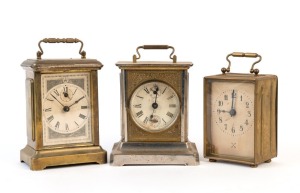 Three carriage style clocks in metal cases, American and German, 19th/20th century, ​​​​​​​the largest 18cm high overall