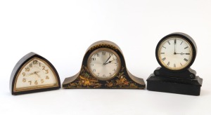 Three antique and vintage table clocks in black cases, 19th and 20th century, ​​​​​​​the largest 17cm high