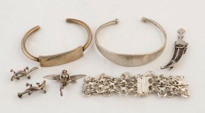 Two silver bangles, a silver bracelet, a silver fairy ornament, a dagger brooch and two lizard brooches, 20th century, (7 items), 82 grams total