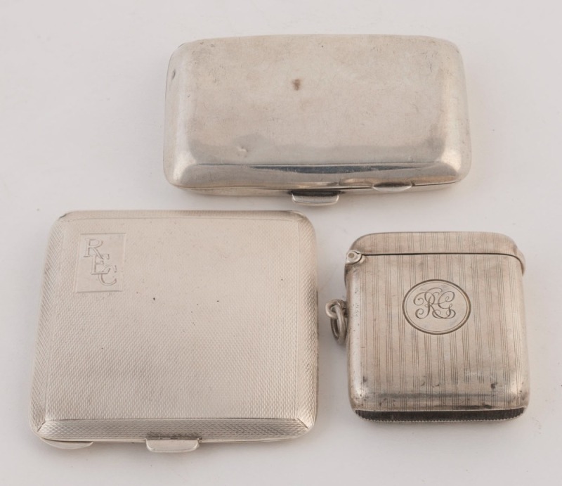 A sterling silver vesta, powder compact and cigarette case, early 20th century, (3 items), the cigarette case 8cm wide