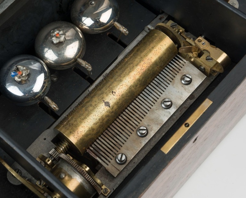 An antique music box in walnut case, 19th century, a 16cm cylinder with