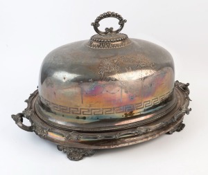 An impressive antique silver plated meat warming tray and cover, 19th century, 40cm high, 63cm across the handles