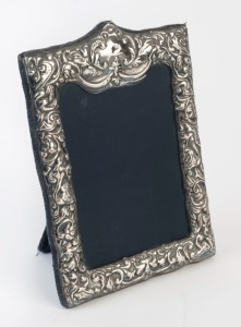 A sterling silver photo frame with blue velvet backing, 20th century, 19 x 13cm