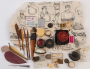 SUNDRY ITEMS. An eclectic mix including 1794 halfpenny "Bath Token" by John Jelly, jewellery and stud boxes, shell purse, writing tools and implements, fossils and natural history specimens, double-sided enamel postage stamp sign, medical glass in leather