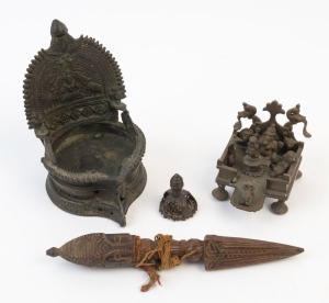 Tibetan phurba, bronze seal and two cast bronze ornaments, 19th/20th century, the phurba19.5cm long