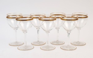 Set of seven vintage wine glasses with gilt decoration, early 20th century, 16cm high