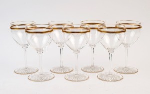 Set of seven vintage wine glasses with gilt decoration, early 20th century, ​​​​​​​16cm high