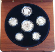 FINE SILVER PROOF SETS; 2003 Volunteers, 2004 Standard Issue and 2006 Decimal 40th. All with wooden cases and certificates. Cat. $820. - 2