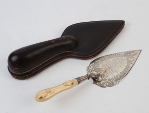 Antique sterling silver presentation trowel with carved ivory handle and original plush fitted box, bearing inscription "Presented To W. D. Shaw ESQ.R. Of Holmefield House, Huddersfield On The Occasion Of His Laying The Corner Stone Of The New Baptist Chapel, Roomfield Lane, Todmorden, Jan. 22, 1876", 33cm long