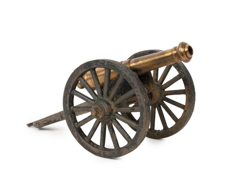 MINIATURE CANNON PAPERWEIGHT: brass & cast iron construction, length 22cm, stamped 'MADE IN USA' on base, 20th century.