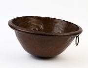 An antique copper scullery bowl, 19th century, 17cm high, 39cm diameter