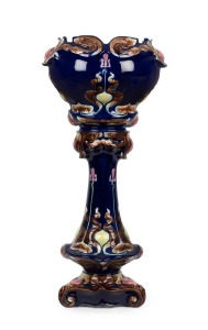 An antique English Art Nouveau majolica porcelain jardinière on stand, circa 1900, 108cm high overall