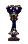 An antique English Art Nouveau majolica porcelain jardinière on stand, circa 1900, ​​​​​​​108cm high overall