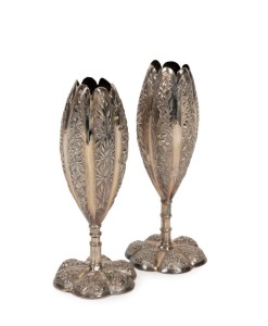 A pair of antique Chinese export silver bud vases, with embossed floral decoration, 19th century, seal mark to bases, 14cm high, 208 grams total