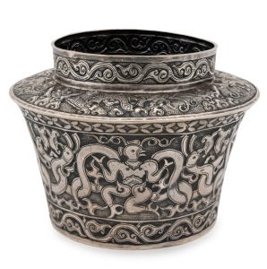 An antique Vietnamese Cham Silver offering bowl, finely decorated in repoussé with four human figures/dancers with bird-like faces, interspersed with four sets of two intertwined phoenix images. The shoulder has four serpents/nagas interspersed with four 