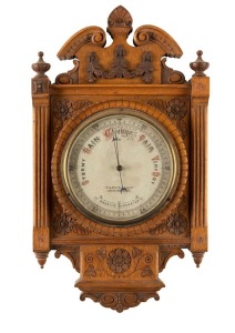 An antique wall barometer mounted in a finely carved oak frame, dial marked "KILPATRICK & CO. LONDON & MELBOURNE", 19th century, ​​​​​​​48cm high overall