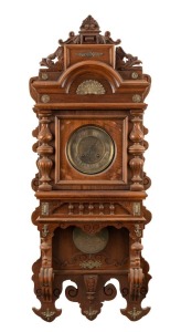 An antique American wall clock in ornate walnut case with gilt metal adornments, 8 day time and strike movement with engraved metal dial and pendulum, 19th century, 101cm high