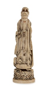 An antique Japanese carved ivory statue, Meiji period, 19th century, 15cm high