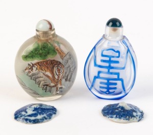 A Peking glass scent bottle, a Chinese glass scent bottle with internal hand-painted tiger scene, together with two antique Chinese blue and white porcelain roundels (note: these two were found in the Victorian goldfields), (4 items), the Peking glass bottle 7cm high