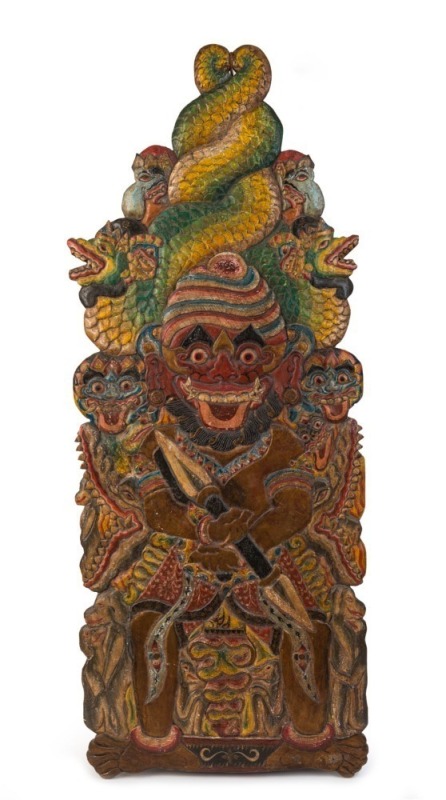 A Balinese carved timber plaque with polychrome finish, 19th/20th century, ​​​​​​​109cm high, 42cm deep