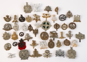 MILITARY BADGES: predominantly British WWI/ WWII era cap badges including Border Regiment (collar badge), Herefordshire Regiment, Kings Royal Rifle Corps, Kings Own Yorkshire Light Infantry, London Scottish 14th Battalion 'Strike Sure', Leicestershire Reg