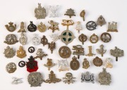 MILITARY BADGES: predominantly British WWI/ WWII era cap badges including Border Regiment (collar badge), Herefordshire Regiment, Kings Royal Rifle Corps, Kings Own Yorkshire Light Infantry, London Scottish 14th Battalion 'Strike Sure', Leicestershire Reg