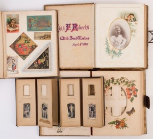 Ornate leather-bound photo album with gilt-edged leaves, brass clasp and eight pages with lithographed decorations; ownership details dated 1897, several cdvs present; another similar album with 12 lithographed pages, all with floral designs; a small leat