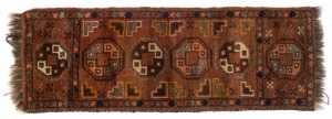 A small and narrow hand-knotted tribal rug, ​​​​​​​120 x 41cm