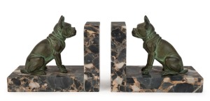 A pair of French Art Deco bronze and marble dog bookends, circa 1930, ​​​​​​​9cm high, 12.5cm long