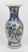 A Chinese blue and white export ware porcelain mantel vase, hand-painted with female musical figures and initialed "T. D.", 44cm high