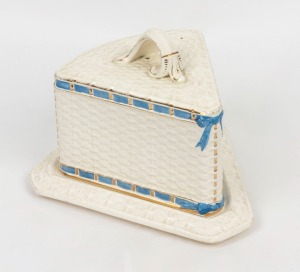 An antique English porcelain cheese dish and cover, 19th century, 21cm high, 28cm wide