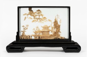 A Chinese carved cork diorama, 20th century, 26cm high, 41cm wide
