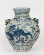 A Yuan style blue and white Chinese porcelain vase with foo dog decoration and masks, 19th/20th century, 26cm high