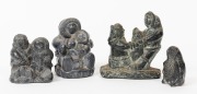 WOLF SCULPTURES group of four Canadian carved stone Inuit statues, all bearing original foil labels, 20th century, ​​​​​​​the largest 12cm high