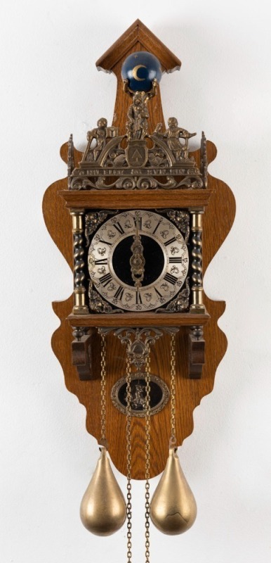 An antique style Dutch twin weight wall clock on oak bracket, 20th century, ​​​​​​​67cm high