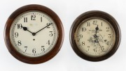 Two antique circular wall clocks in timber cases, 19th/20th century, the larger 41cm diameter