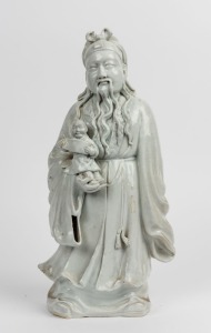 Blanc de chine porcelain statue of a man and child 19th/20th century,42cm high